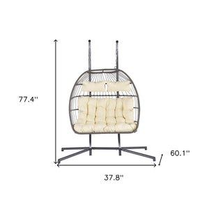 HomeRoots Beige Double Swing Chair for Two - Stylish Indoor/Outdoor Seating with Durable Wicker Design 555425