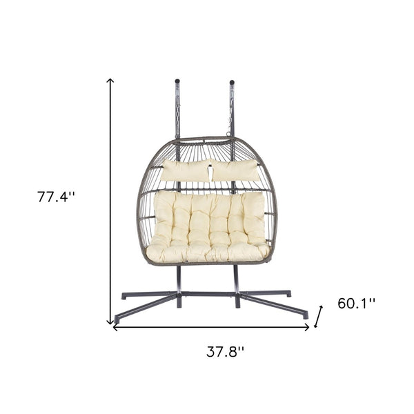 HomeRoots Beige Double Swing Chair for Two - Stylish Indoor/Outdoor Seating with Durable Wicker Design 555425