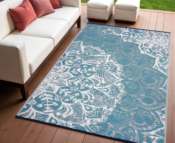 Homeroots 4' X 6' Teal Blue Floral Braided Area Rug - Durable, Uv-protected, Stain-resistant For Any Home  Polypropylene 555571