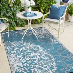 Homeroots 5' Teal Blue Floral Area Rug - 5x8 Machine Braided, Uv Protected, Stain Resistant For Indoor/Outdoor Use  Polypropylene 555572