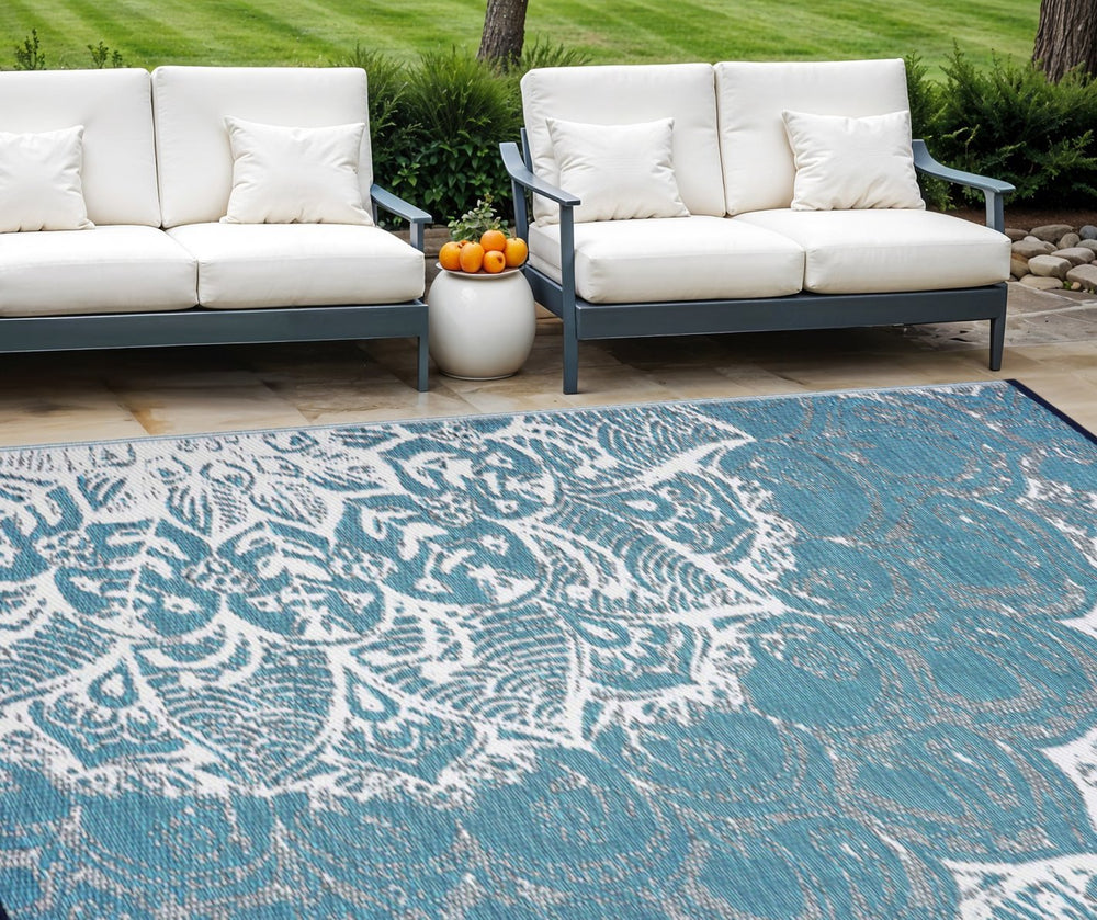 Homeroots 8' Teal Blue Floral Area Rug - Stain-resistant, Uv-protected Indoor/Outdoor Decor For Any Space  Polypropylene 555575
