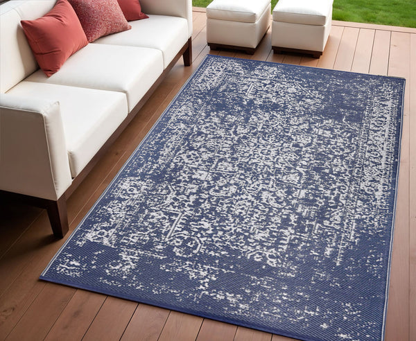 Homeroots 4' Navy Blue Indoor Outdoor Area Rug - Distressed Design, Stain Resistant, Uv Protected, Stylish Comfort  Polypropylene 555578