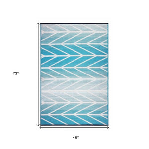 Homeroots 4' X 6' Aqua Geometric Area Rug - Stain Resistant, Indoor/Outdoor, Uv Protected, Stylish & Durable  Polypropylene 555602