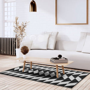Homeroots 3' X 5' Black And White Geometric Area Rug - Stylish, Stain-resistant, Uv-protected For Modern Spaces  Polypropylene 555607