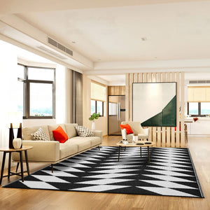 Homeroots 8' X 10' Black And White Geometric Area Rug – Stylish, Stain Resistant, Indoor/Outdoor Decor Solution  Polypropylene 555609