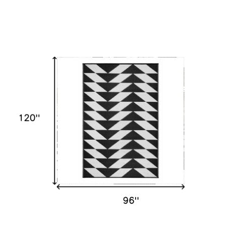 Homeroots 8' X 10' Black And White Geometric Area Rug – Stylish, Stain Resistant, Indoor/Outdoor Decor Solution  Polypropylene 555609