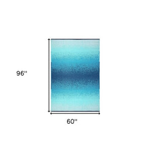 Homeroots 5' X 8' Teal Blue Distressed Area Rug - Stylish, Stain Resistant, Uv Protected For Indoor & Outdoor Use  Polypropylene 555622