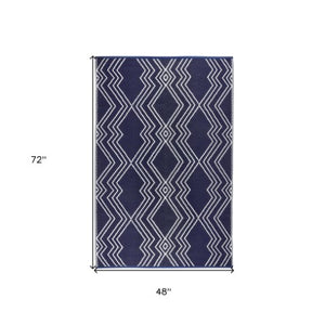 Homeroots 4' X 6' Blue Geometric Area Rug - Stain Resistant, Uv Protected, Perfect For Homes With Kids & Pets  Polypropylene 555634