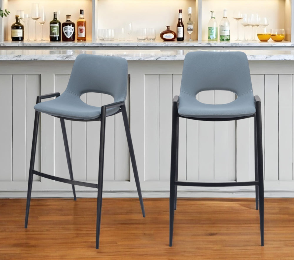 Homeroots Set Of Two 30" Blue And Black Faux Leather And Steel Low Back Bar Height Bar Chairs   555659