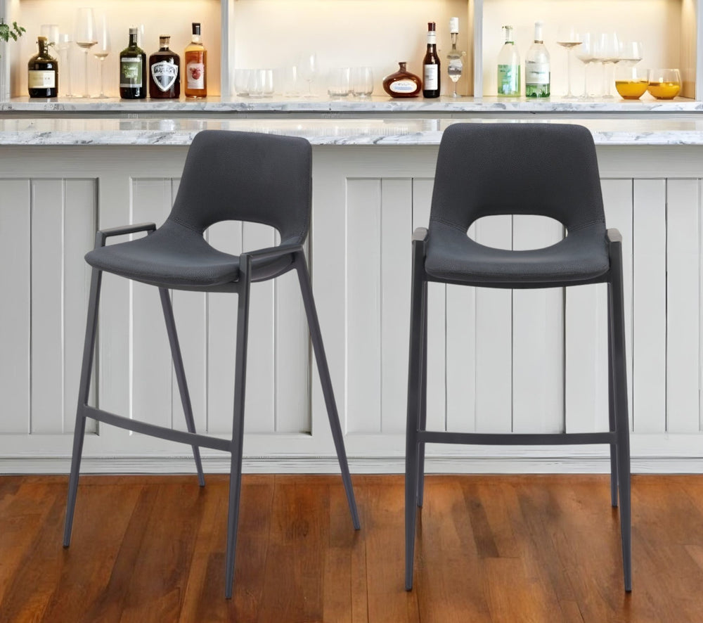 Homeroots Set Of Two 30" Black Faux Leather And Steel Low Back Bar Height Bar Chairs   555667
