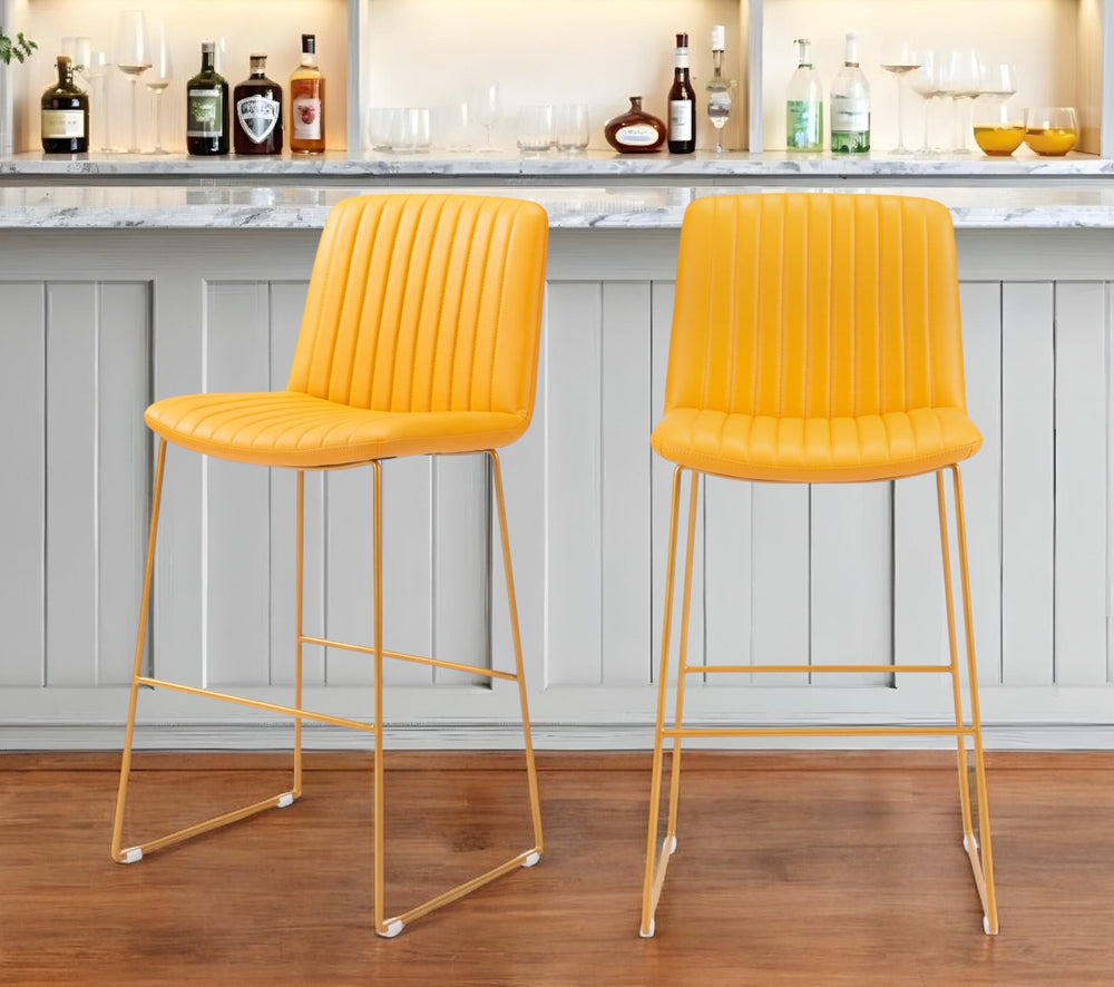 Homeroots Set Of Two 30" Yellow Faux Leather And Steel Bar Height Bar Chairs   555675
