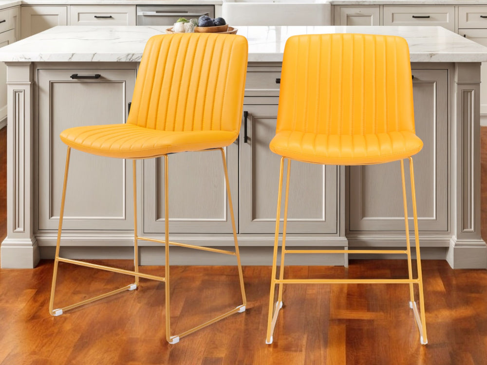 Homeroots Set Of Two 26" Yellow Faux Leather And Steel Counter Height Bar Chairs   555679