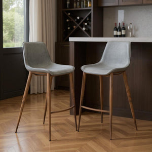 HomeRoots Set of Two Stylish Slate Gray Faux Leather Bar Chairs with Durable Brown Steel Frame for Comfort 555681