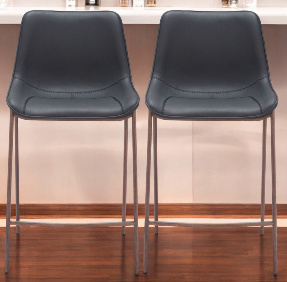 Homeroots Set Of Two 30" Black And Brown Faux Leather And Steel Bar Height Bar Chairs   555686
