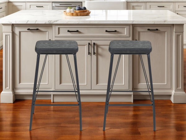 Homeroots Set Of Two 26" Black Faux Leather And Steel Backless Counter Height Bar Chairs   555699