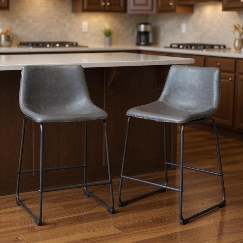 HomeRoots Set of Two Contemporary Charcoal Faux Leather Bar Chairs with Durable Steel Frame for Modern Spaces 555730