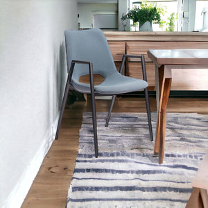 HomeRoots Set of Two Modern Blue and Black Upholstered Faux Leather Dining Arm Chairs for Stylish Comfort 555821