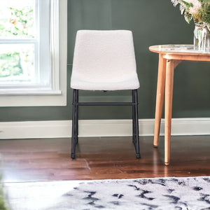 HomeRoots Set of Two Stylish Ivory Faux Fur Dining Chairs with Black Legs for Modern Homes and Comfort 555828