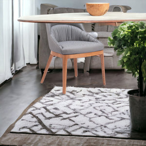 HomeRoots Set of Two Stylish Gray and Brown Faux Leather Dining Chairs for Versatile Home Seating Solutions 555871