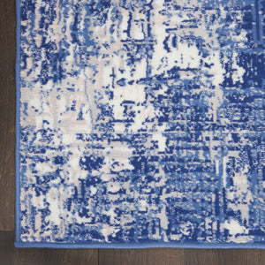 Homeroots 8' X 12' Ivory And Blue Abstract Distressed Area Rug  Polypropylene 555940