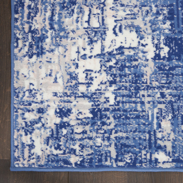 Homeroots 8' X 12' Ivory And Blue Abstract Distressed Area Rug  Polypropylene 555940