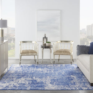HomeRoots 8' Abstract Distressed Area Rug in Ivory and Blue – Modern, Durable Design for High-Traffic Spaces 8' X 12' 555940