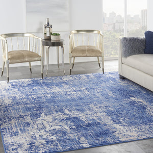 HomeRoots 8' Abstract Distressed Area Rug in Ivory and Blue – Modern, Durable Design for High-Traffic Spaces 7' X 10' 556171