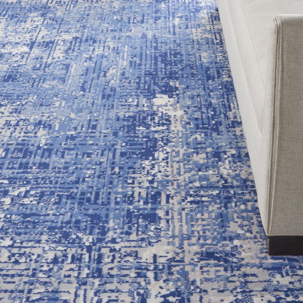 HomeRoots 8' Abstract Distressed Area Rug in Ivory and Blue – Modern, Durable Design for High-Traffic Spaces 7' X 10' 556171