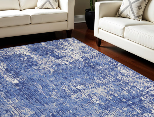 Homeroots 8' X 10' Ivory And Blue Abstract Distressed Area Rug  Polypropylene 556173