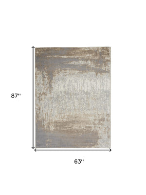 Homeroots 5' X 7' Gray And Ivory Abstract Non Skid Area Rug  Polypropylene 556214