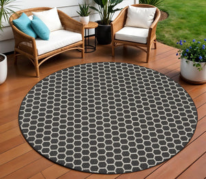 HomeRoots 8' Black and Ivory Geometric Rug - Durable, Reversible, Modern Design for Indoor & Outdoor Spaces 556309