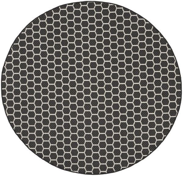HomeRoots 8' Black and Ivory Geometric Rug - Durable, Reversible, Modern Design for Indoor & Outdoor Spaces 556309