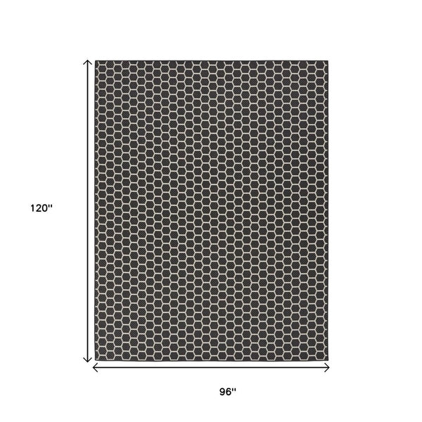 HomeRoots 8' X 10' Stylish Black and Ivory Geometric Area Rug - Versatile Indoor/Outdoor Flatwoven Design! 556310