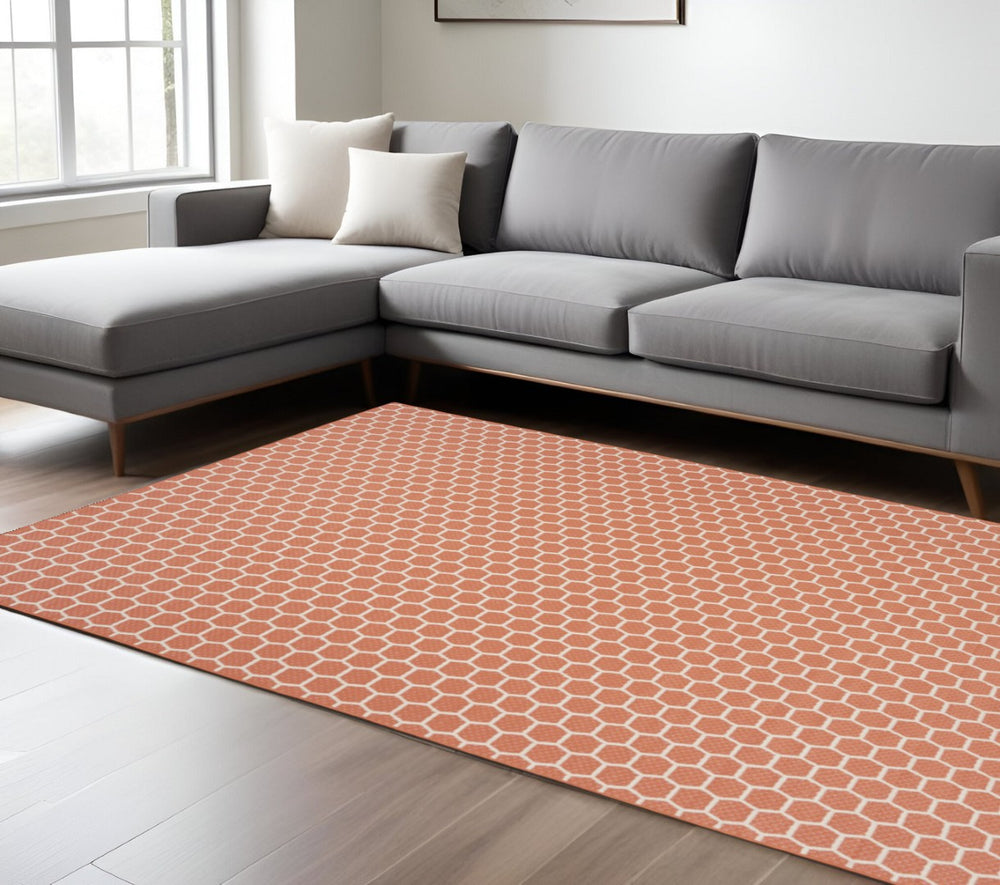 HomeRoots 9' X 12' Coral and Ivory Geometric Area Rug – Stylish Indoor/Outdoor Design, Reversible & Easy-Care! 556321