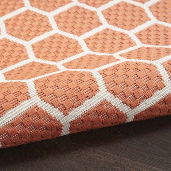 HomeRoots 10' Coral and Ivory Geometric Area Rug - Stylish Indoor/Outdoor Flatwoven Design for Versatile Spaces 556322