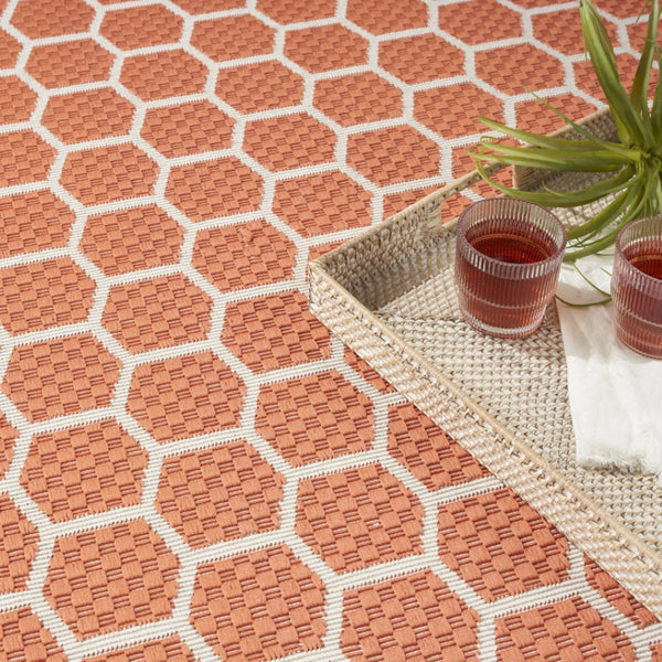 HomeRoots 10' Coral and Ivory Geometric Area Rug - Stylish Indoor/Outdoor Flatwoven Design for Versatile Spaces 556322
