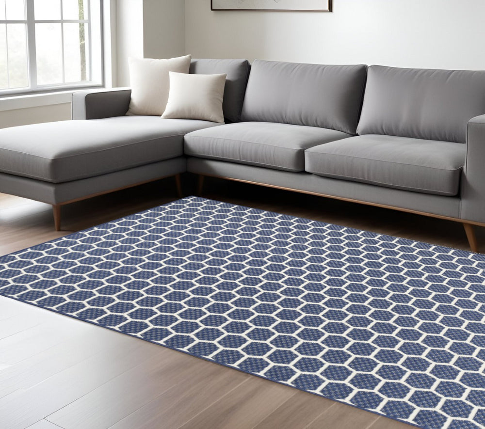 HomeRoots 9' Geometric Navy Blue and Ivory Area Rug - Stylish, Reversible Indoor/Outdoor Design for Modern Spaces 556336
