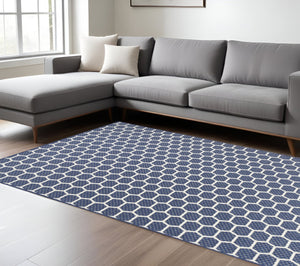HomeRoots 9' Geometric Navy Blue and Ivory Area Rug - Stylish, Reversible Indoor/Outdoor Design for Modern Spaces 556336