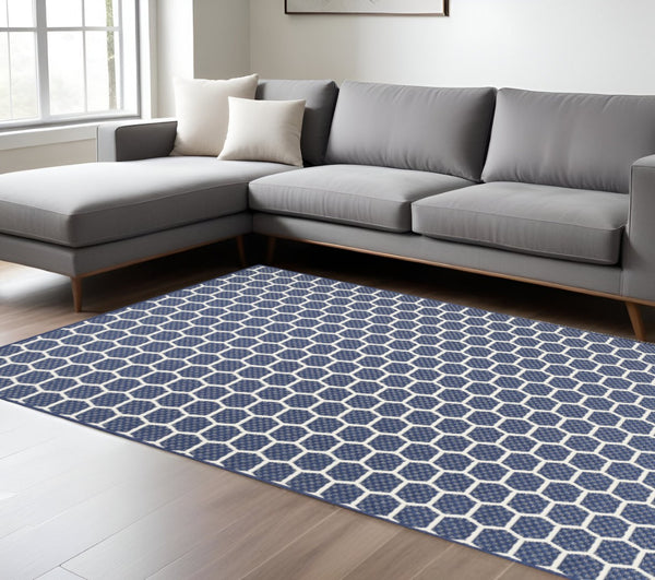 HomeRoots 9' Geometric Navy Blue and Ivory Area Rug - Stylish, Reversible Indoor/Outdoor Design for Modern Spaces 556336