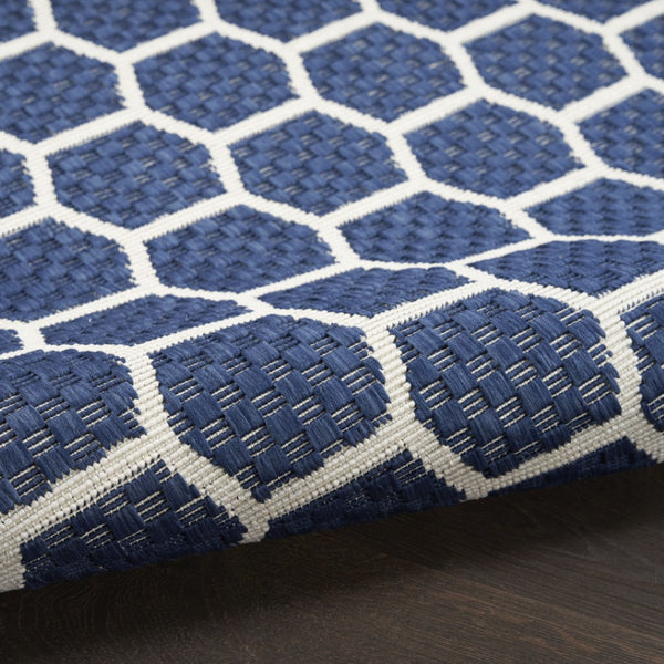 HomeRoots 9' Geometric Navy Blue and Ivory Area Rug - Stylish, Reversible Indoor/Outdoor Design for Modern Spaces 556336