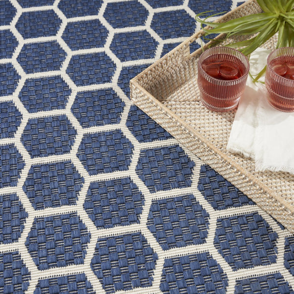 HomeRoots 9' Geometric Navy Blue and Ivory Area Rug - Stylish, Reversible Indoor/Outdoor Design for Modern Spaces 556336