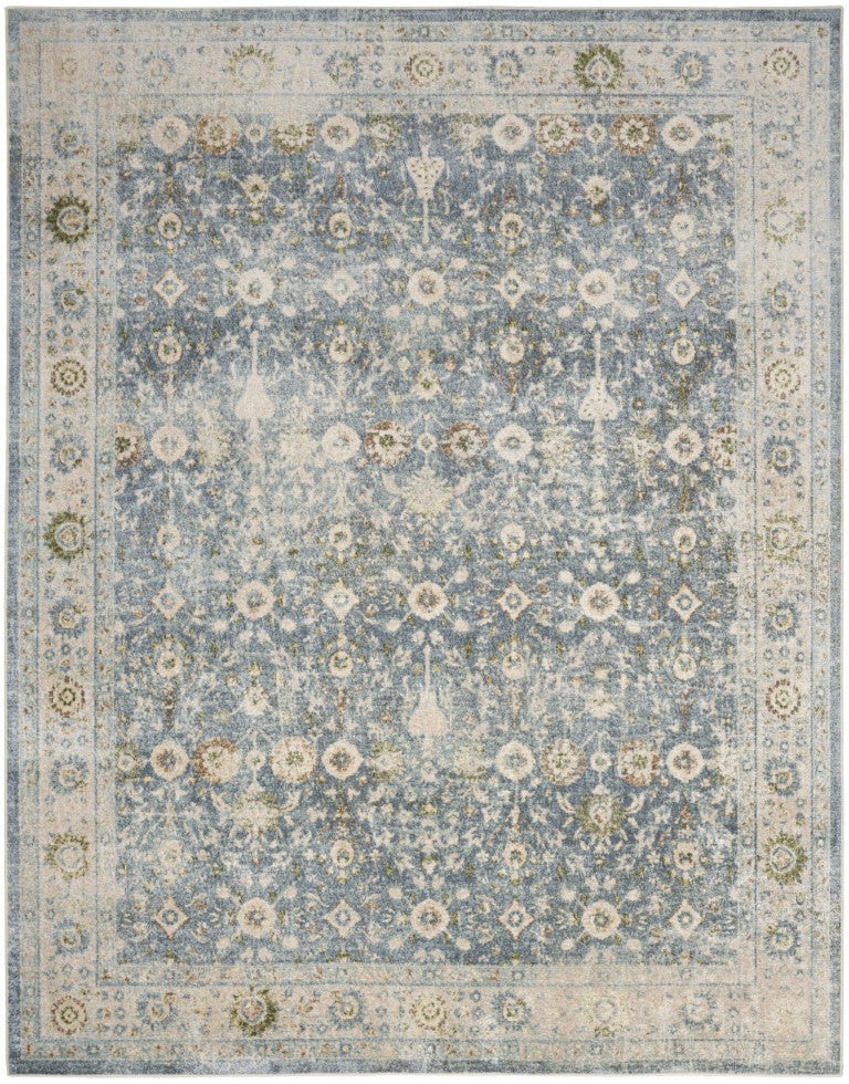 8 Foot by 10 Blue Floral Polyester Area Rug with Distressed Vintage Appeal