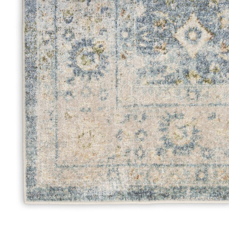 8 Foot by 10 Blue Floral Polyester Area Rug with Distressed Vintage Appeal