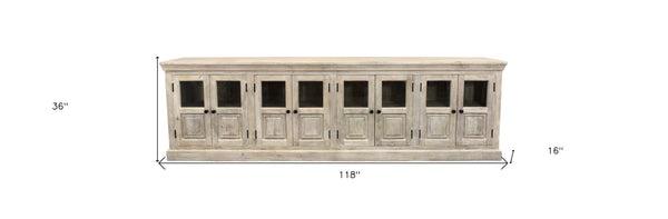 Homeroots 118" White Solid Wood Distressed Sideboard - Coastal Charm With 8 Glass Doors & Antique Hardware   557698