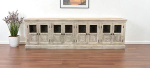 HomeRoots 118" Antiqued White Distressed Solid Wood Sideboard with 8 Glass Doors for Elegant Storage Solutions 557698