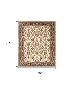 Homeroots 5' X 8' Ivory And Black Oriental Hand Tufted Non Skid Area Rug  Wool Blend 558175