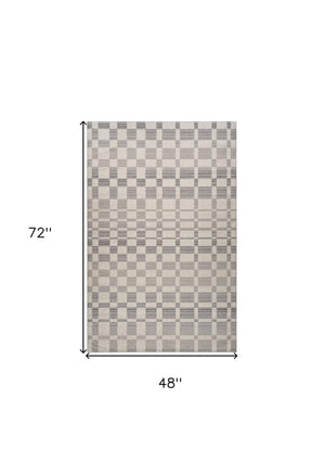 Homeroots 4' X 6' Gray And Beige Checkered Distressed Area Rug  Polypropylene 558389