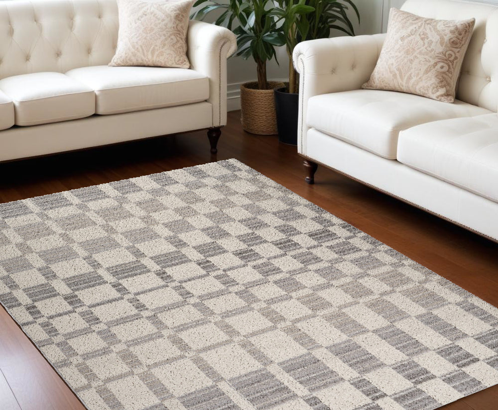 Homeroots 8' X 11' Gray And Beige Checkered Distressed Area Rug  Polypropylene 558392