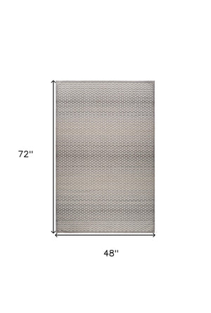 Homeroots 4' X 6' Gray And Beige Moroccan Distressed Area Rug  Polypropylene 558399