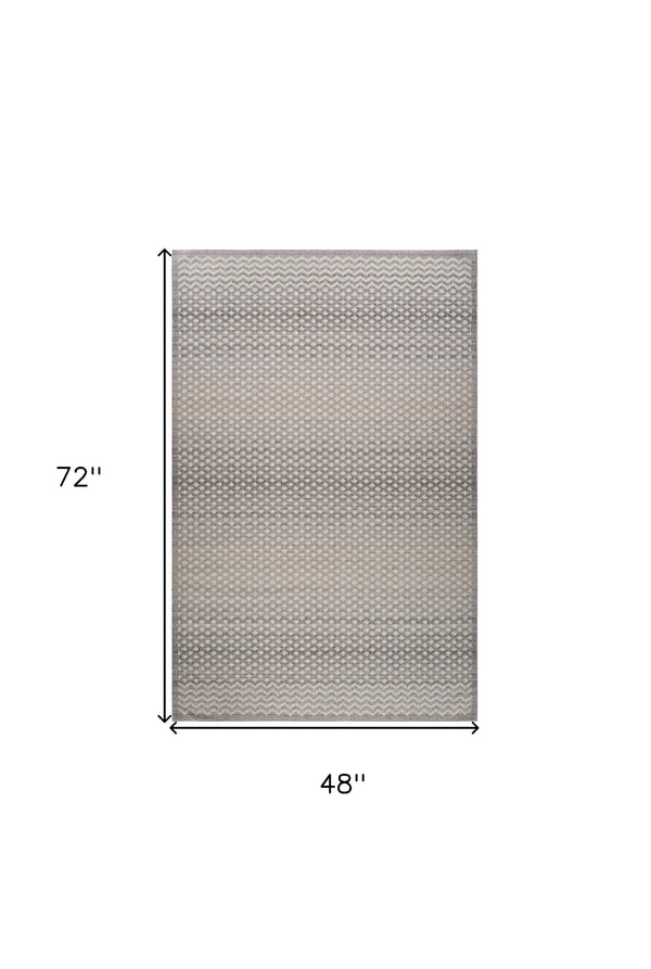 Homeroots 4' X 6' Gray And Beige Moroccan Distressed Area Rug  Polypropylene 558399